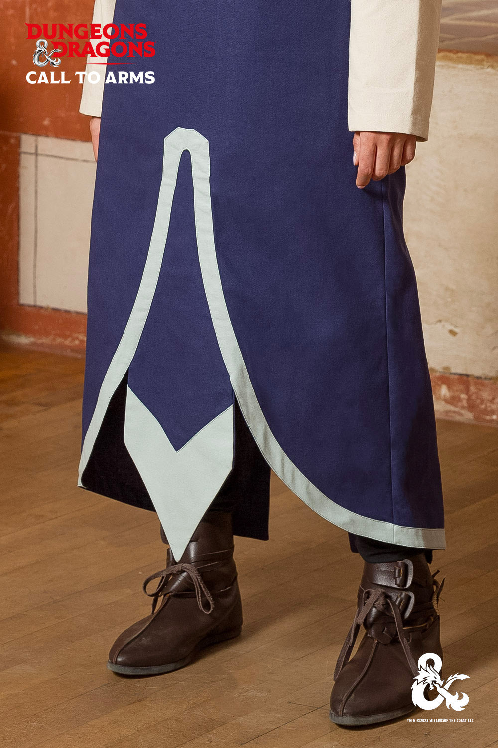 Dungeons & Dragons Cleric Tabard in Dark Blue and Ice Blue with contrast color accents and sleeveless design.