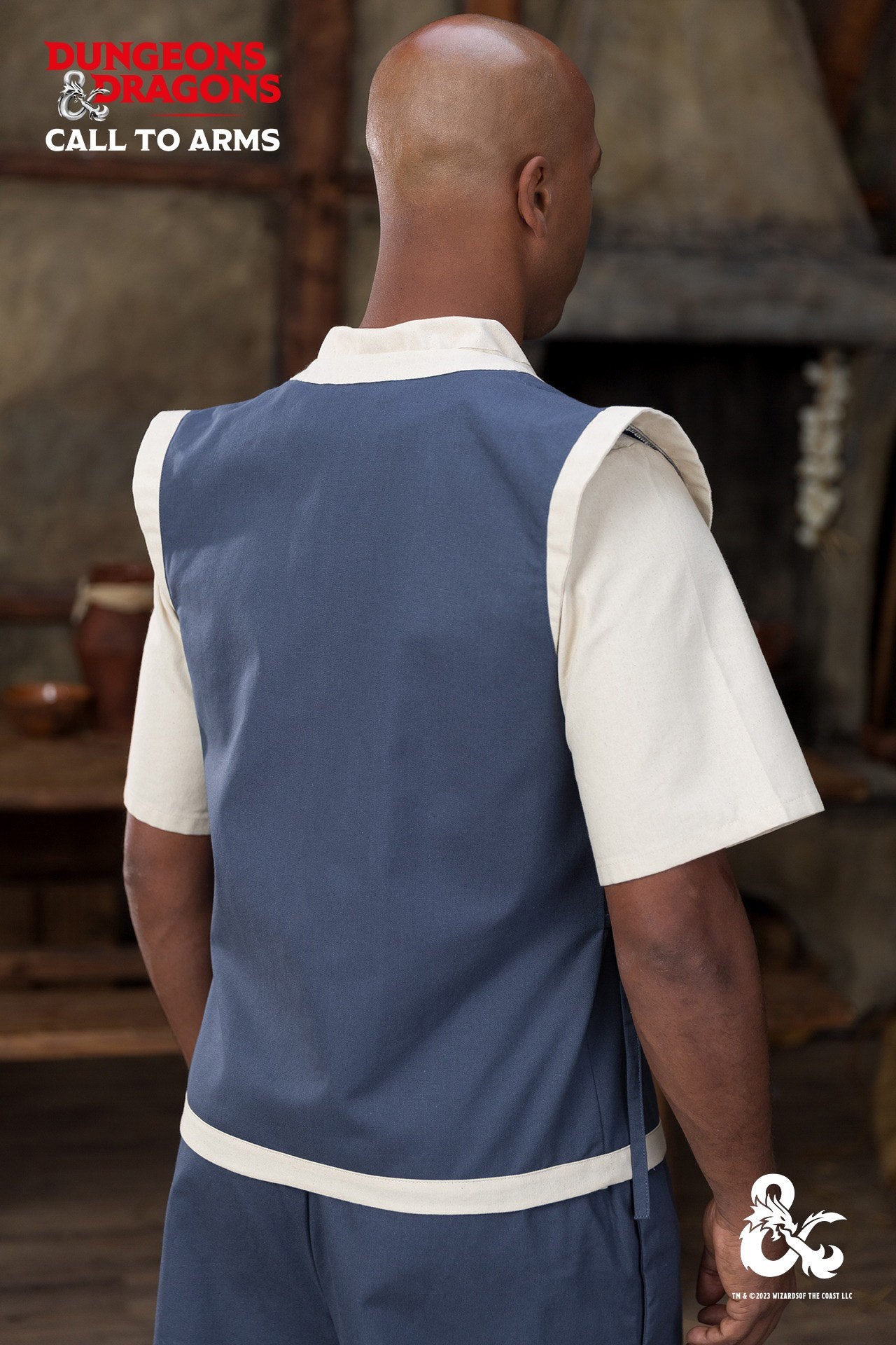 Dungeons & Dragons Monk Vest in Woad Blue/Natural with wrapped front and contrast trims, perfect for role-playing and martial arts.