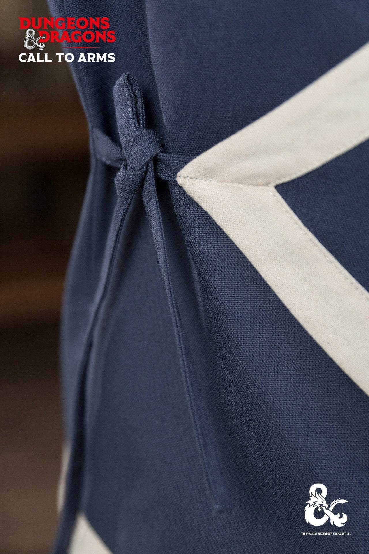 Dungeons & Dragons Monk Vest in Woad Blue/Natural with wrapped front and contrast trims, perfect for role-playing and martial arts.