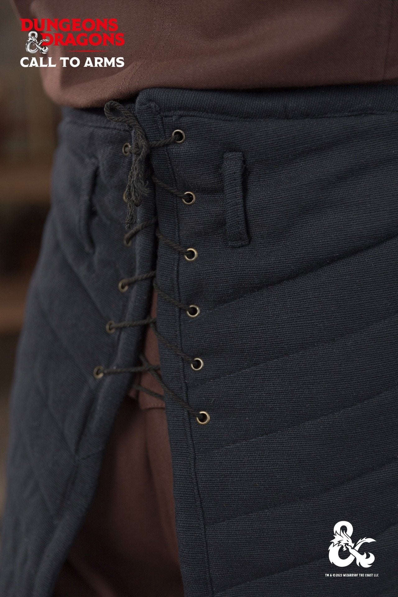 Black Dungeons & Dragons Ranger Tassets with quilted design and lacing for adjustable fit, perfect for adventurers.