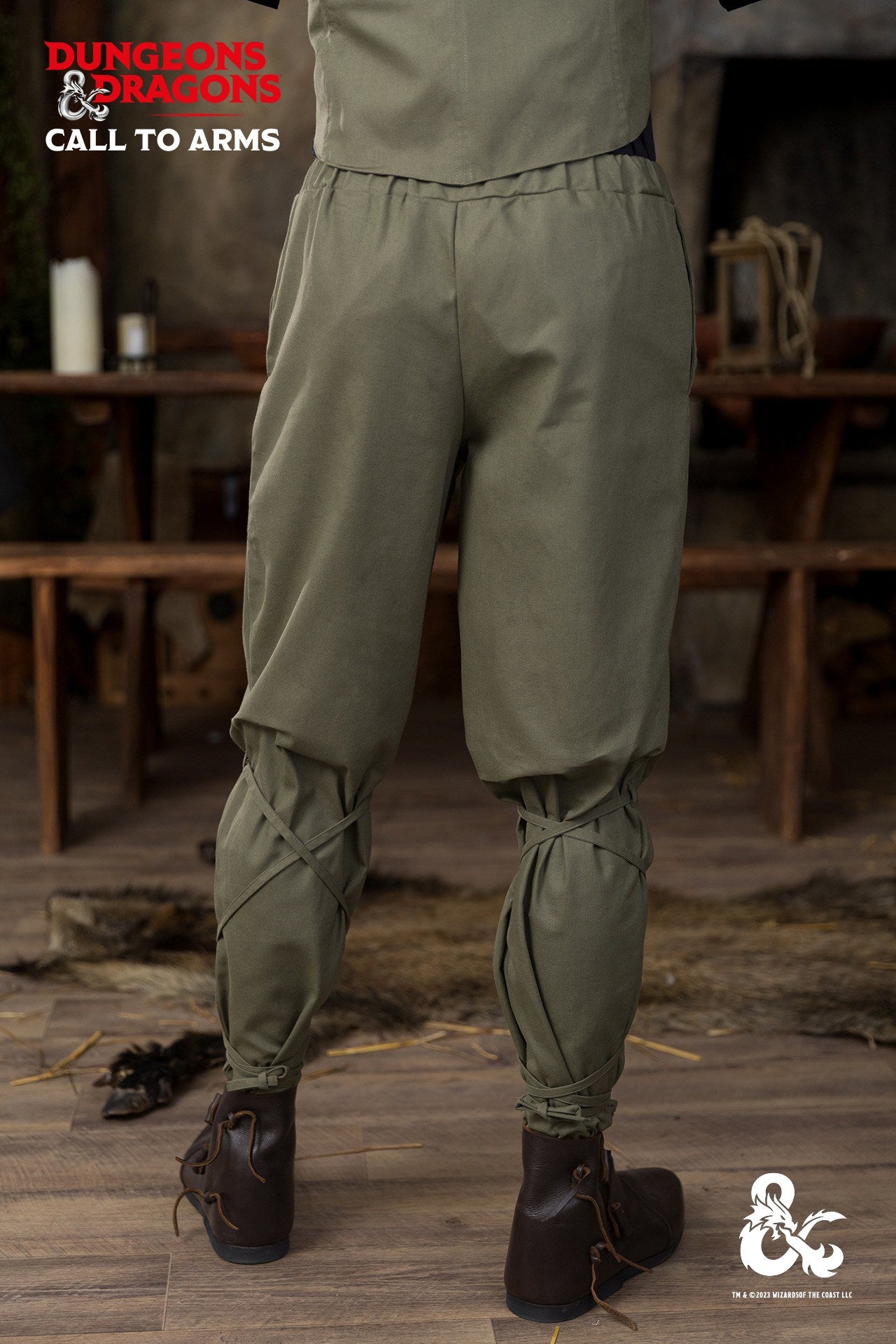 Dungeons & Dragons Ranger Trousers in Seaweed color, featuring an elastic waistband, side seam pockets, and unique lacing below the knees.