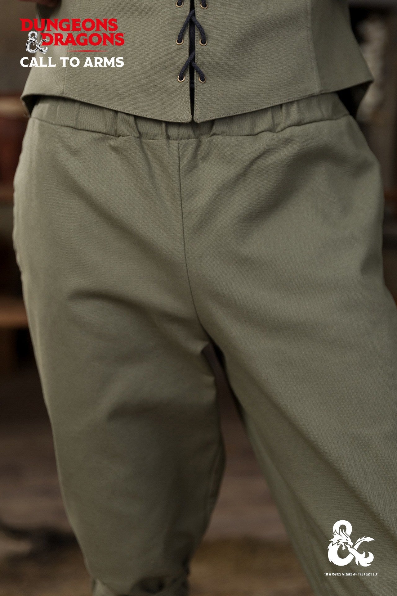 Dungeons & Dragons Ranger Trousers in Seaweed color, featuring an elastic waistband, side seam pockets, and unique lacing below the knees.