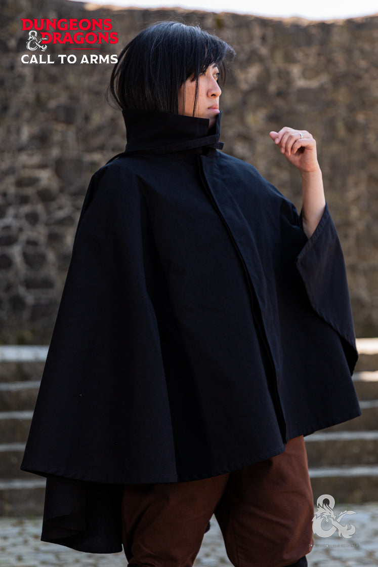 Dungeons & Dragons Rogue Cape in black, featuring a turn-over collar, drawstrings for a hood, and a hidden button pocket.