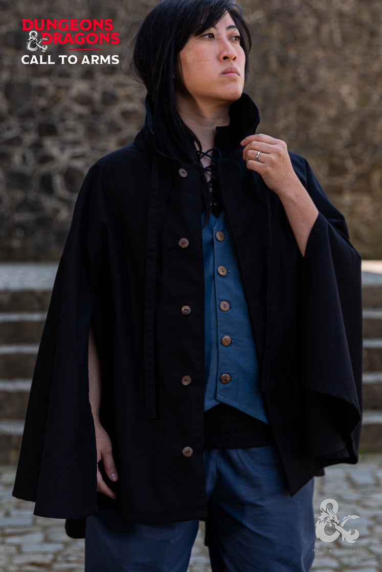 Dungeons & Dragons Rogue Cape in black, featuring a turn-over collar, drawstrings for a hood, and a hidden button pocket.