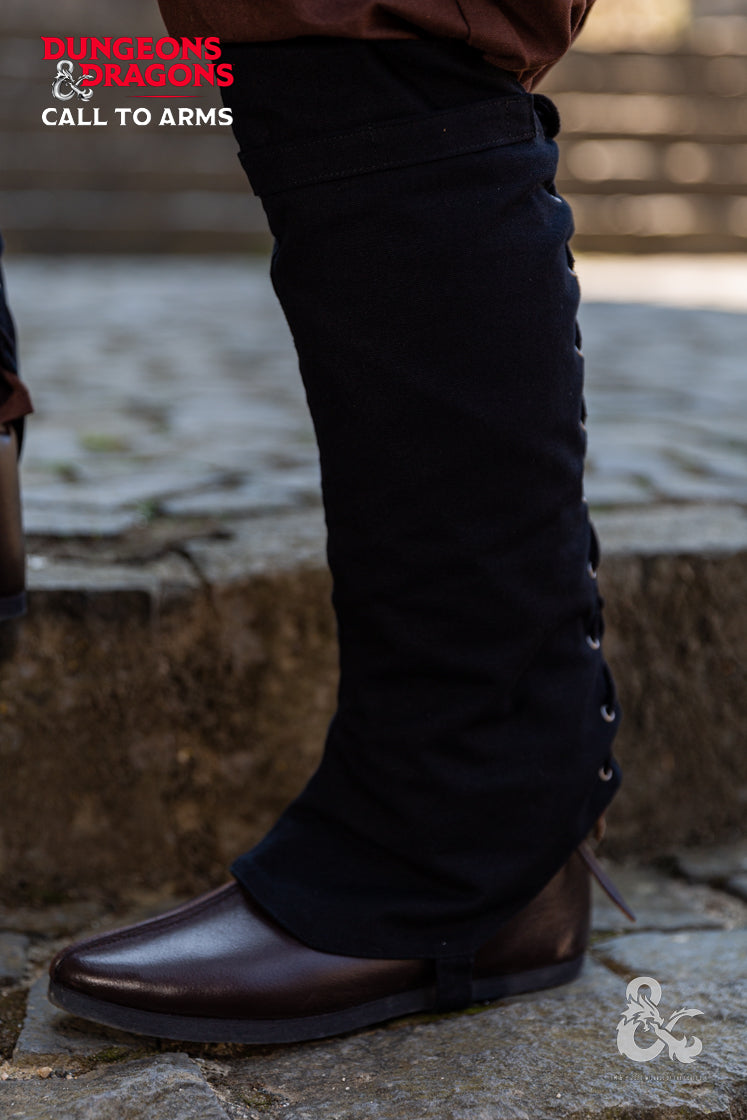 Black Dungeons & Dragons Rogue Gaiters designed for leg protection during adventures, featuring laced back and upper calf strip for weapons.