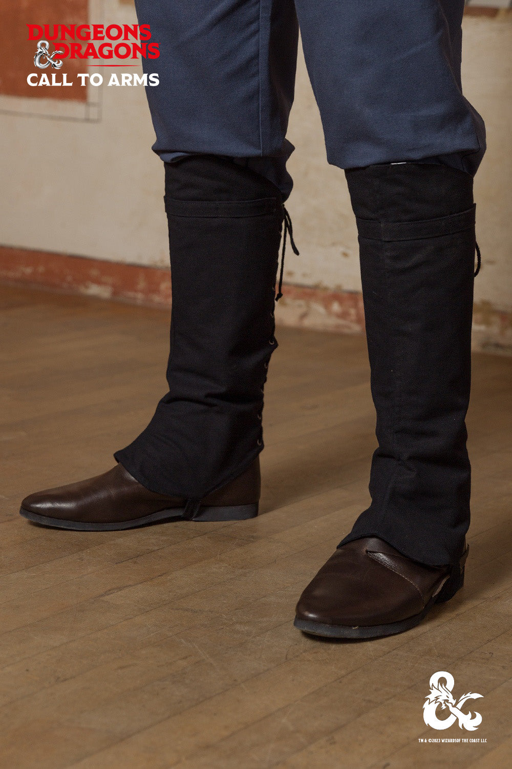 Black Dungeons & Dragons Rogue Gaiters designed for leg protection during adventures, featuring laced back and upper calf strip for weapons.