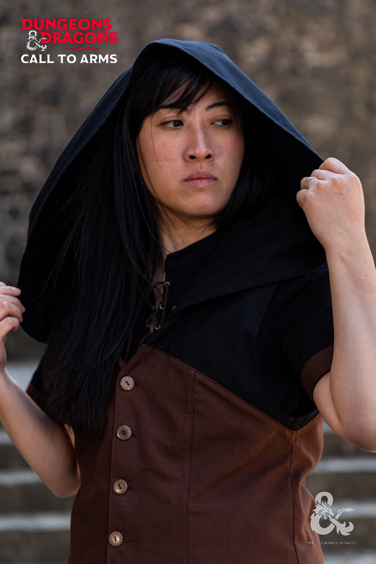 Brown Dungeons & Dragons Rogue Hooded Vest with buttoned hood and pointed hem, showcasing contrast color at shoulders.