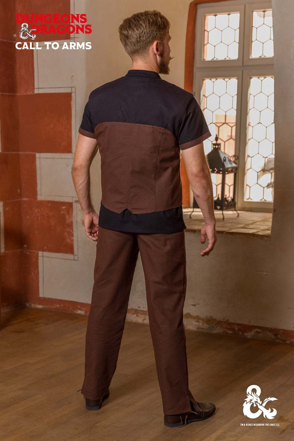 Brown Dungeons & Dragons Rogue Hooded Vest with buttoned hood and pointed hem, showcasing contrast color at shoulders.