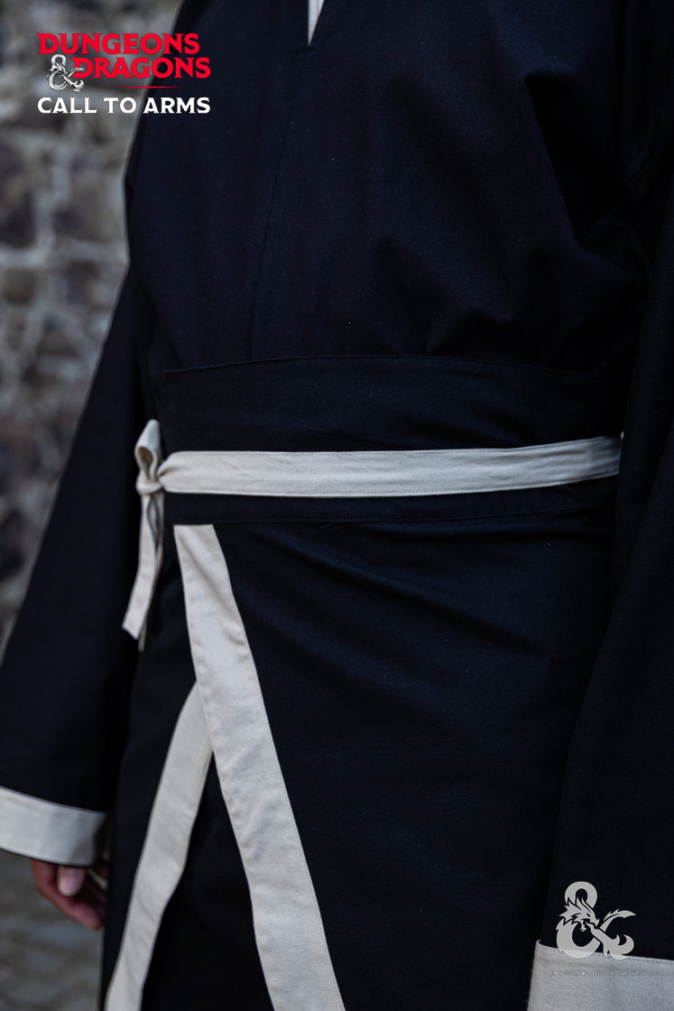 Dungeons & Dragons Wizard Battle Skirt in Black and Natural colors, featuring a wrapped design and contrast waistband.