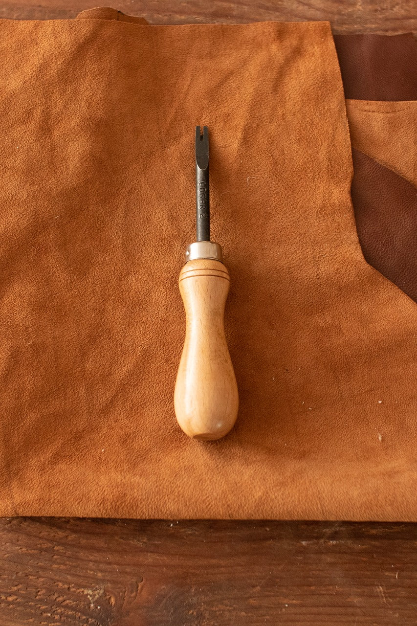 Edge Beveler with beechwood handle and 1.5 mm blade for leather crafting.