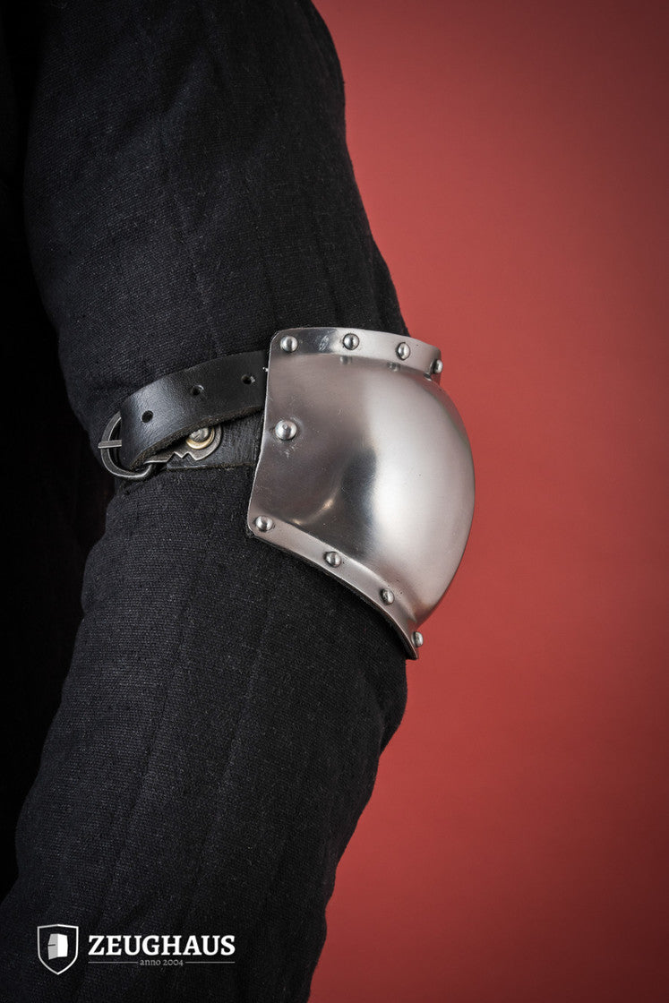 Polished 14th Century Elbow Caps with robust buckles and anti-rust interior, designed for LARP and historical reenactments.