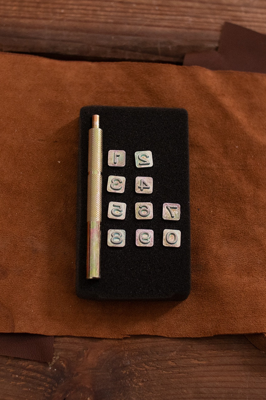 Embossing Tool Set Numbers SIMPLE featuring 10 iron stamps and a handle for leather crafting.