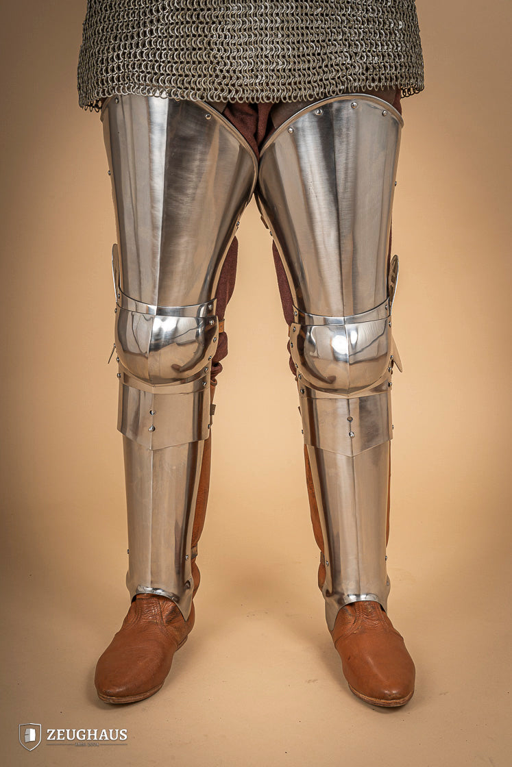 Full Leg Armour made of 1.6 mm polished steel with adjustable knee joints, featuring a satin finish and brass buckles.