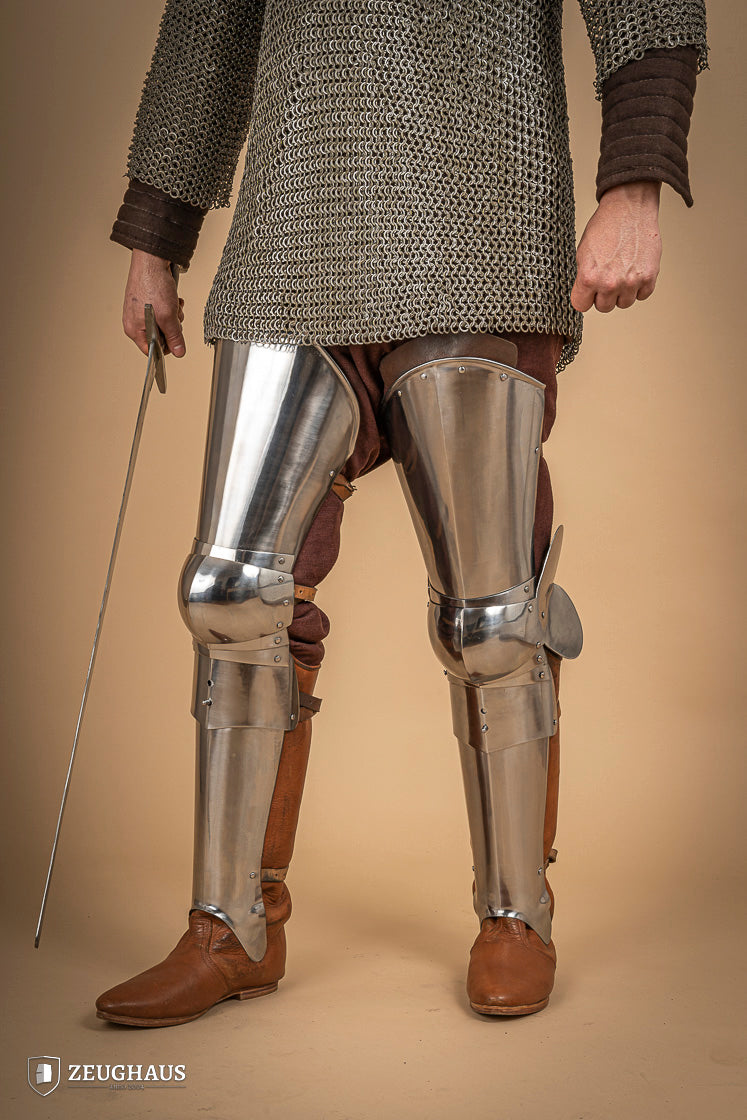Full Leg Armour made of 1.6 mm polished steel with adjustable knee joints, featuring a satin finish and brass buckles.