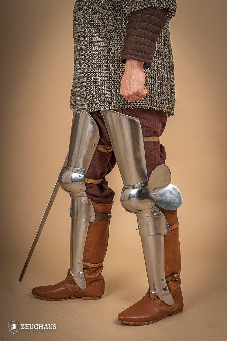 Full Leg Armour made of 1.6 mm polished steel with adjustable knee joints, featuring a satin finish and brass buckles.