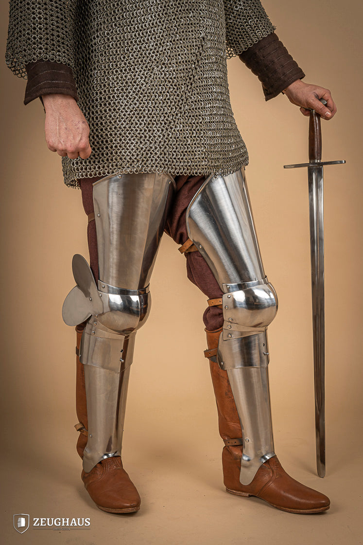 Full Leg Armour made of 1.6 mm polished steel with adjustable knee joints, featuring a satin finish and brass buckles.