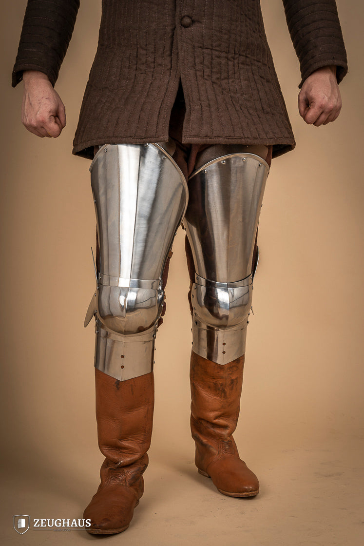Full Leg Armour made of 1.6 mm polished steel with adjustable knee joints, featuring a satin finish and brass buckles.