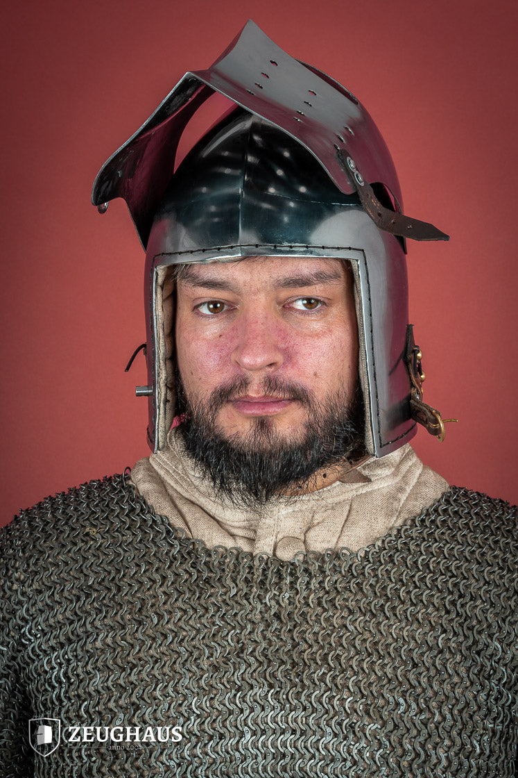 A polished 2mm steel Full Visor Bascinet Helmet with an adjustable visor and leather strap, showcasing its craftsmanship and design.