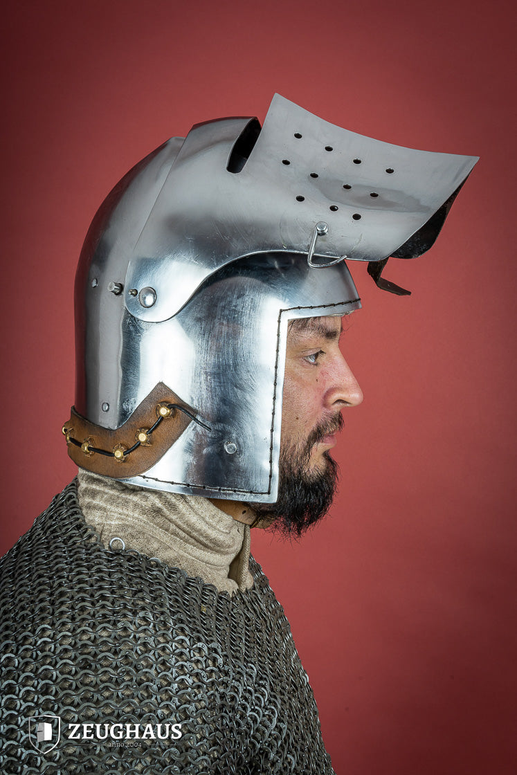 A polished 2mm steel Full Visor Bascinet Helmet with an adjustable visor and leather strap, showcasing its craftsmanship and design.