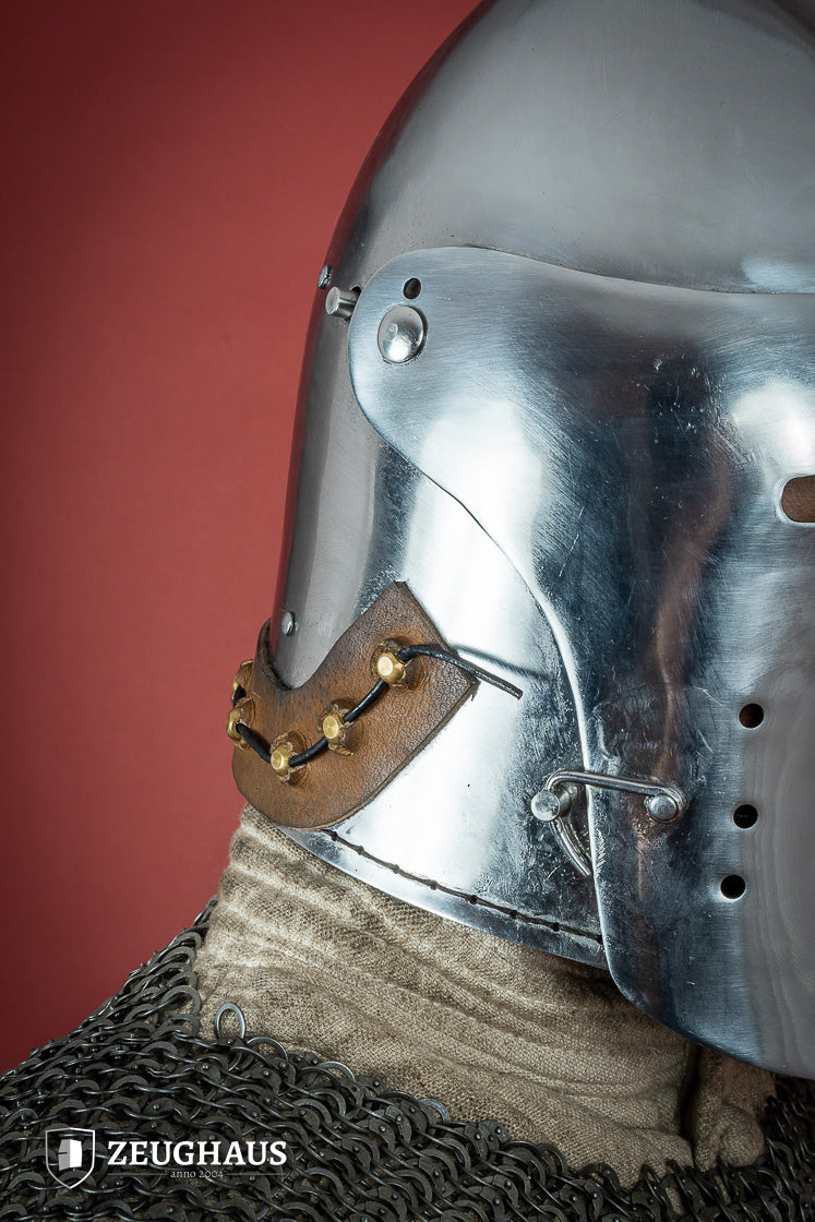 A polished 2mm steel Full Visor Bascinet Helmet with an adjustable visor and leather strap, showcasing its craftsmanship and design.