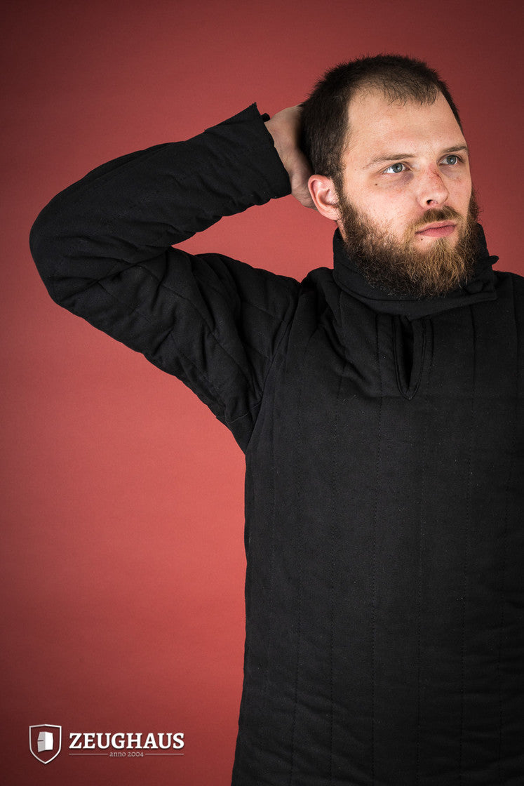 A detailed view of the 13th Century Black Gambeson featuring a stand-up collar and seamless construction, perfect for historical reenactments.