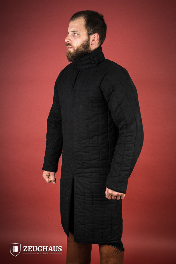 A detailed view of the 13th Century Black Gambeson featuring a stand-up collar and seamless construction, perfect for historical reenactments.