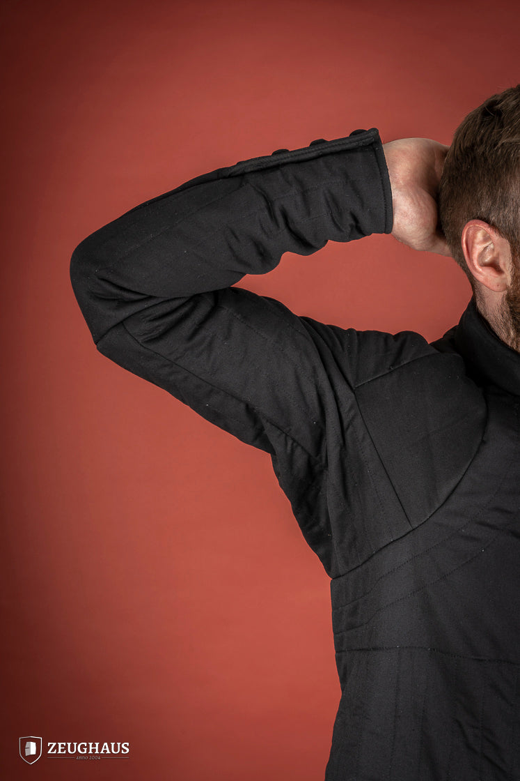14th Century Black Gambeson featuring 100% cotton fabric and polyester padding, designed for mobility and protection.