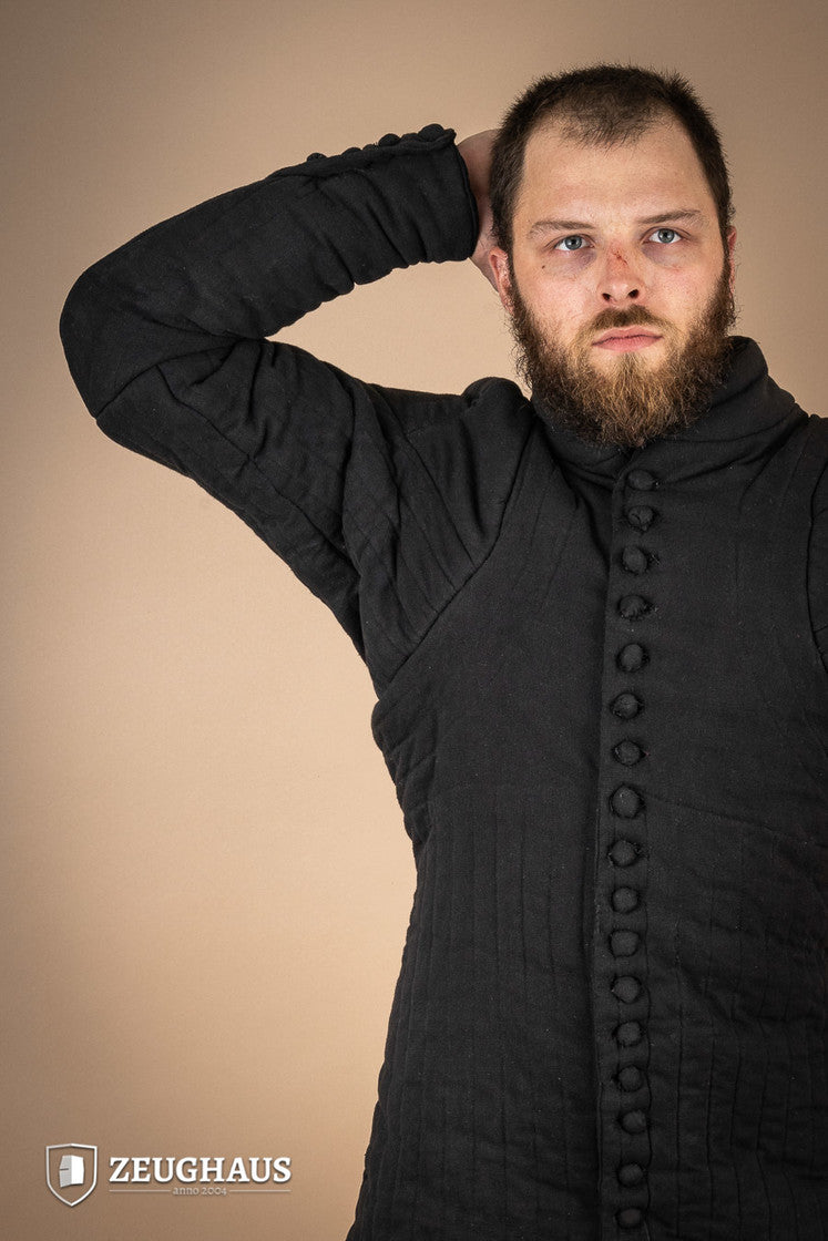 Gambeson 14th Cent. Black, a historical padded garment with button closure, inspired by Charles IV of France, showcasing medieval craftsmanship.