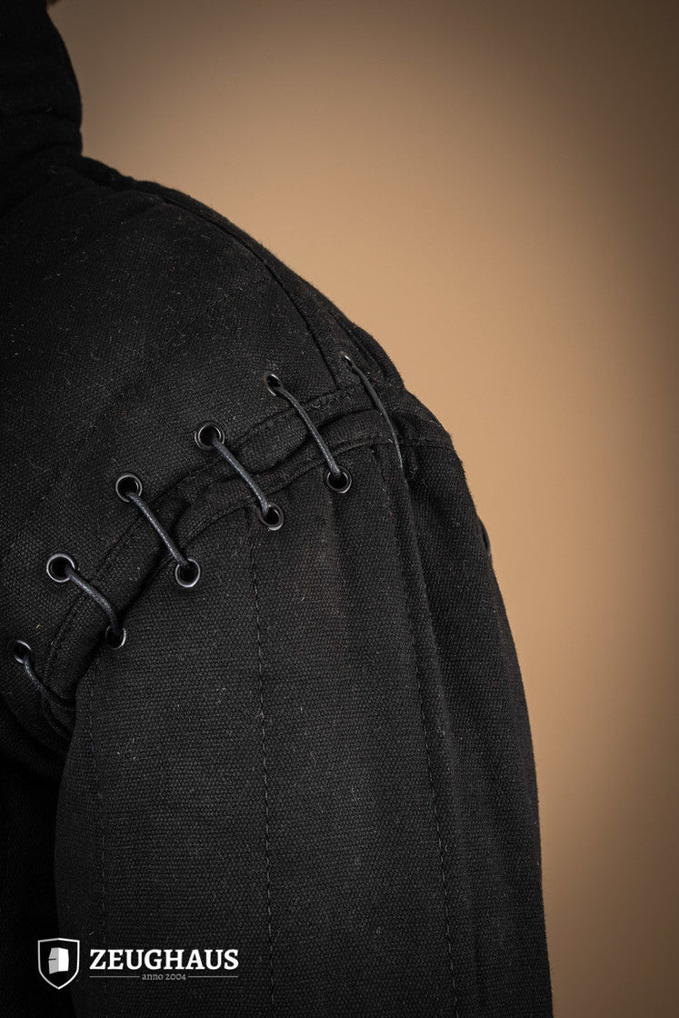 Black gambeson featuring removable laced arms and sturdy buckles for easy dressing, designed for mobility and combat scenarios.