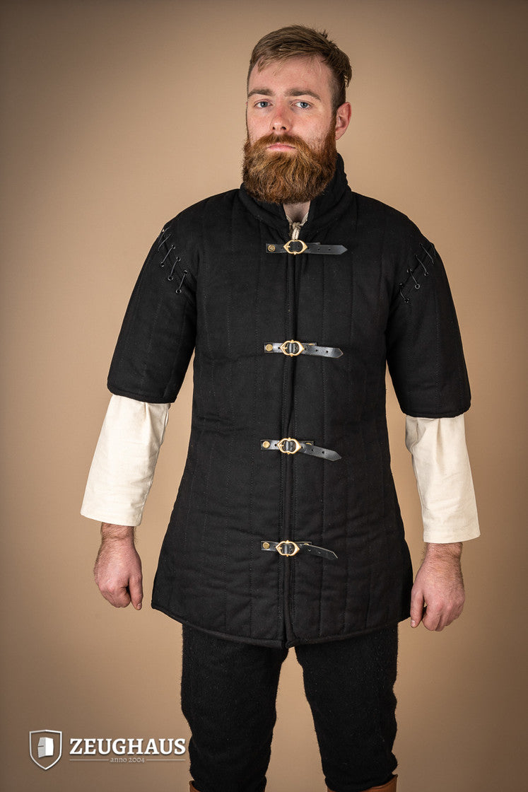 Black gambeson featuring removable laced arms and sturdy buckles for easy dressing, designed for mobility and combat scenarios.