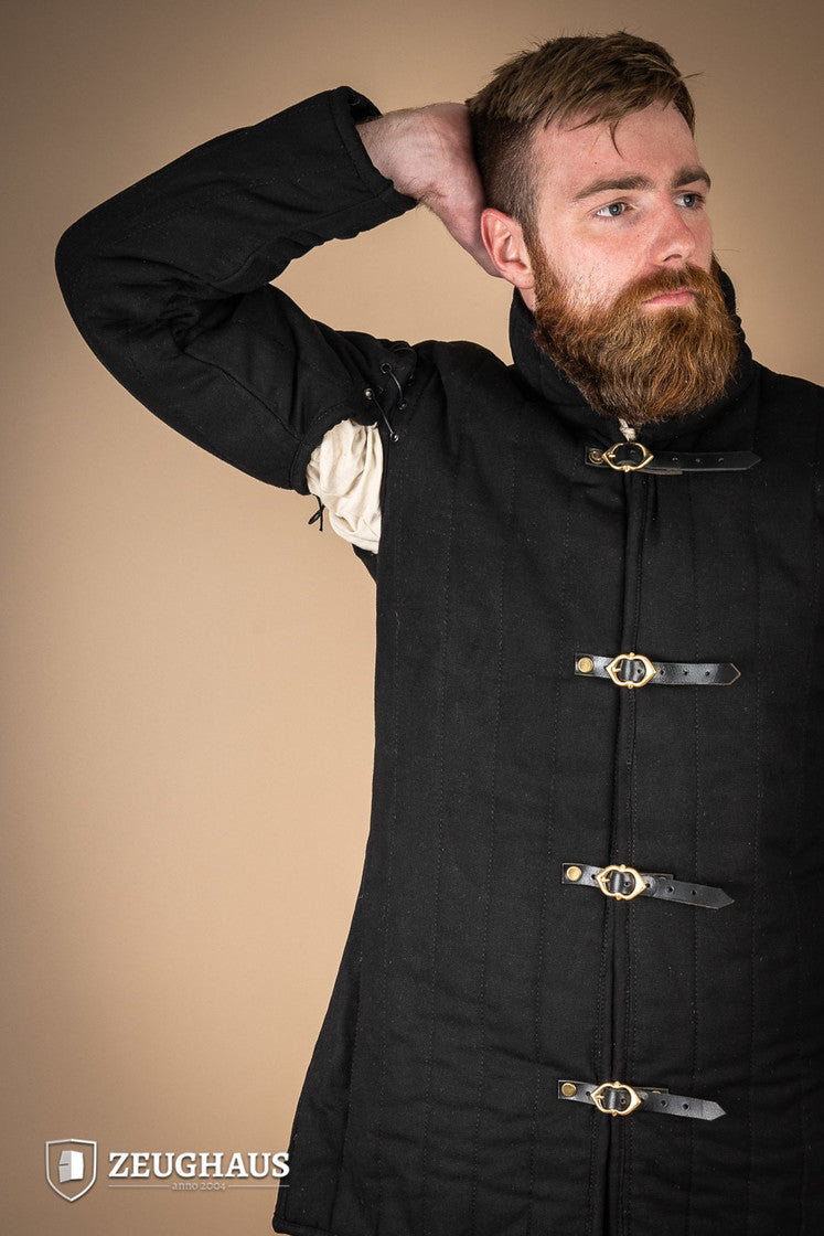 Black gambeson featuring removable laced arms and sturdy buckles for easy dressing, designed for mobility and combat scenarios.