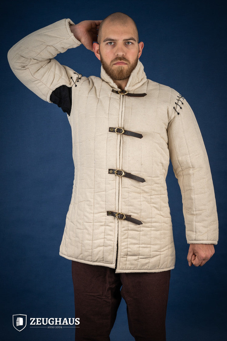 Gambeson with removable laced arms in natural color, featuring buckles for easy wear and open underarm design for mobility.