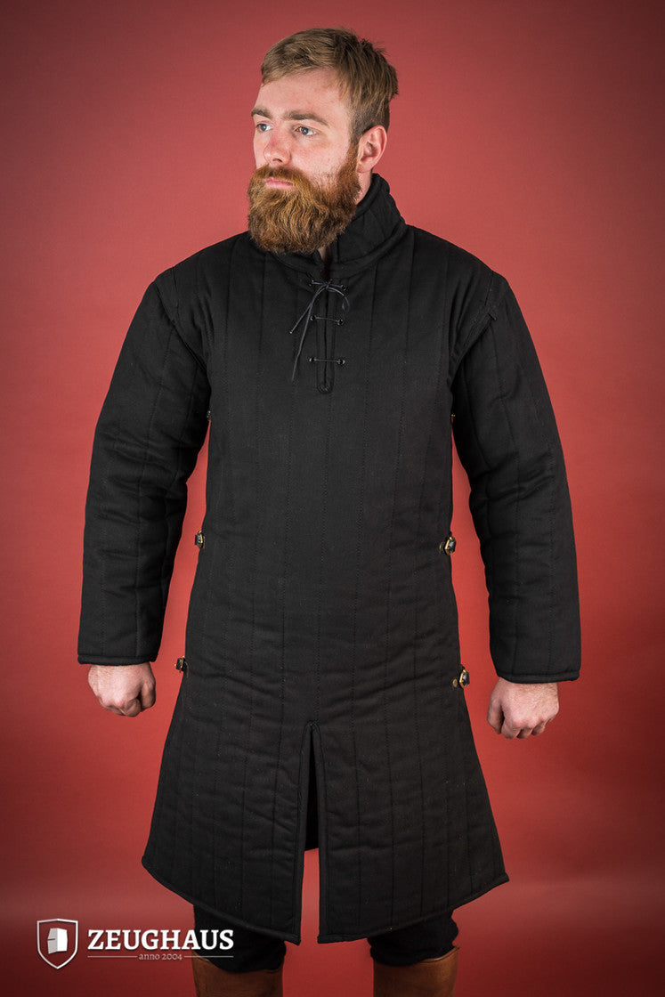 Black gambeson featuring side buckles and modified neckline, inspired by medieval illustrations.