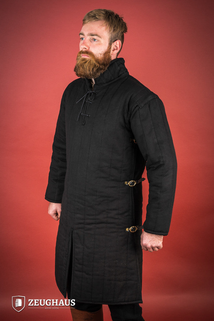 Black gambeson featuring side buckles and modified neckline, inspired by medieval illustrations.