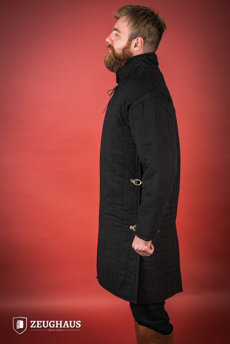 Black gambeson featuring side buckles and modified neckline, inspired by medieval illustrations.