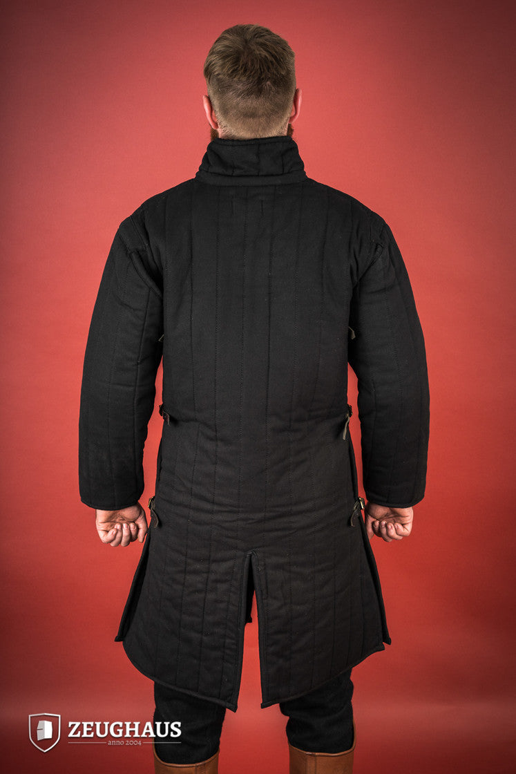 Black gambeson featuring side buckles and modified neckline, inspired by medieval illustrations.