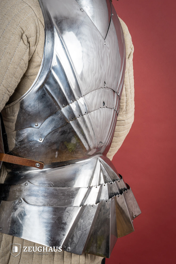 German Cuirass 15th Century 1.2mm Polished armor with hanging tassets, showcasing elegant design and craftsmanship.