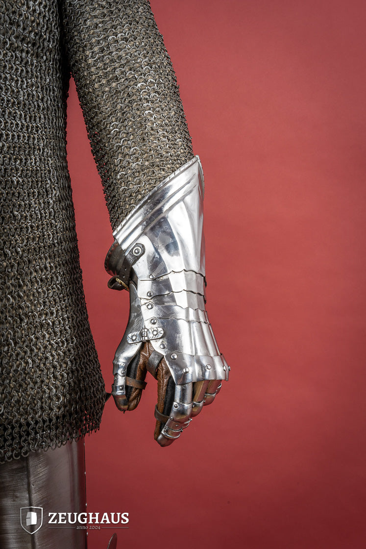 15th Century German Gauntlets made of 1.2mm polished steel with ornate designs and leather gloves.