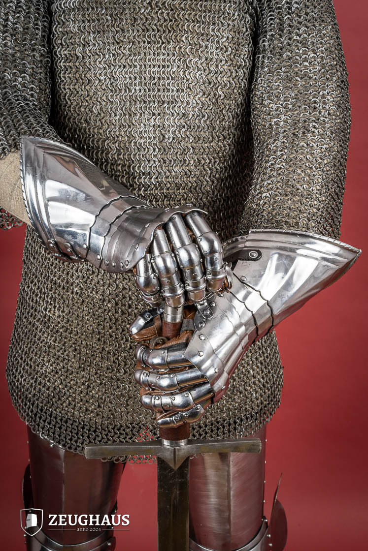 15th Century German Gauntlets made of 1.2mm polished steel with ornate designs and leather gloves.