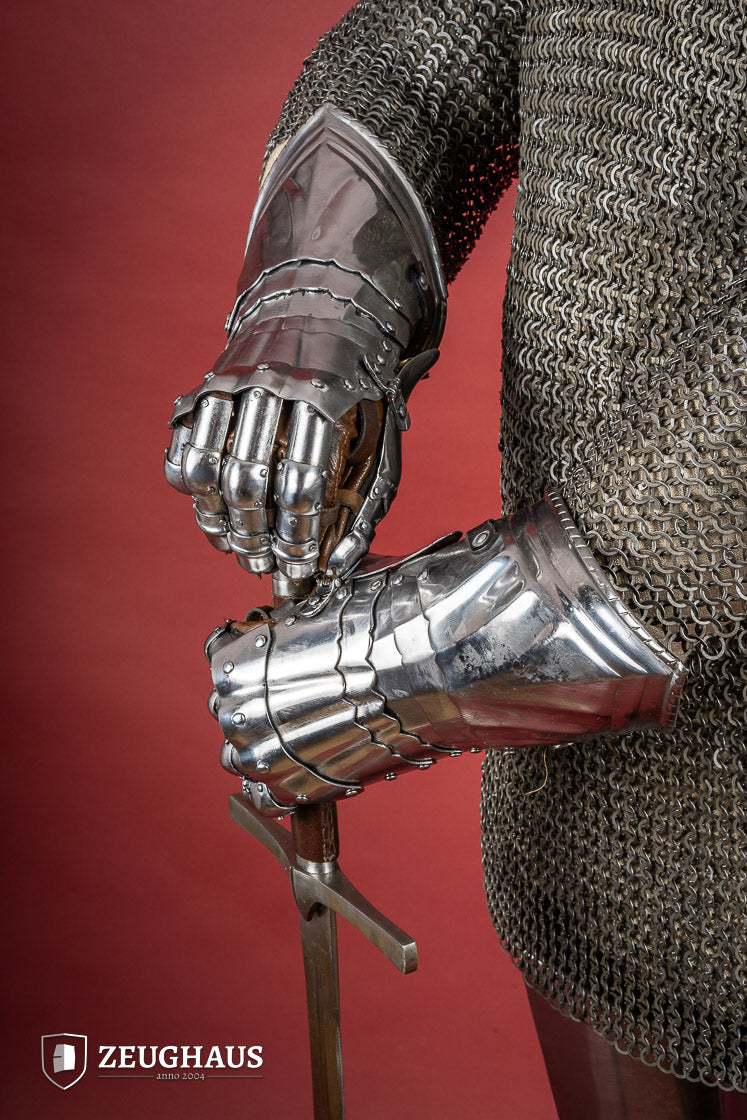 15th Century German Gauntlets made of 1.2mm polished steel with ornate designs and leather gloves.