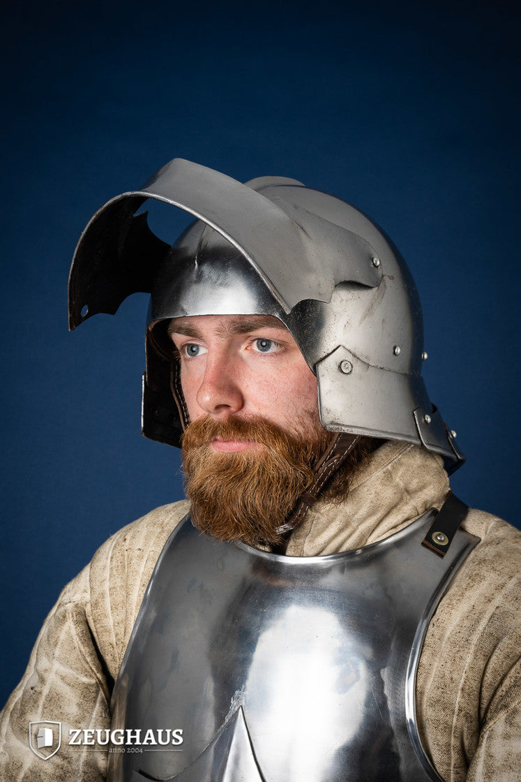 Polished German Sallet Helmet from the 15th century with adjustable visor and leather lining, showcasing historical craftsmanship.