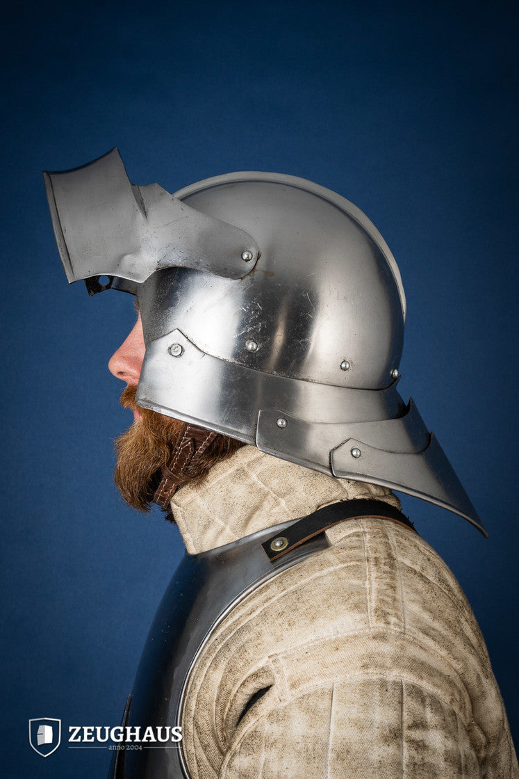 Polished German Sallet Helmet from the 15th century with adjustable visor and leather lining, showcasing historical craftsmanship.