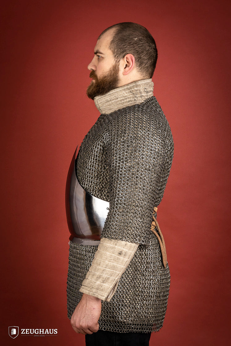 A polished 1.6mm steel half breastplate showcasing its historical design and adjustable features, perfect for reenactments.