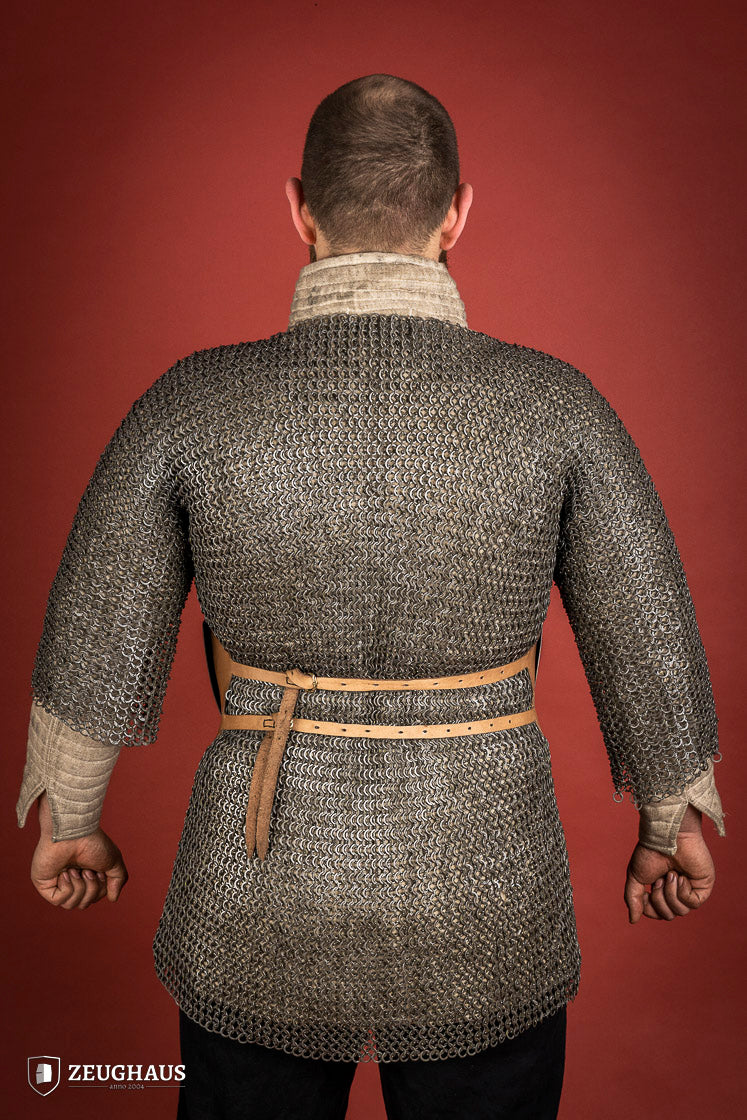 A polished 1.6mm steel half breastplate showcasing its historical design and adjustable features, perfect for reenactments.