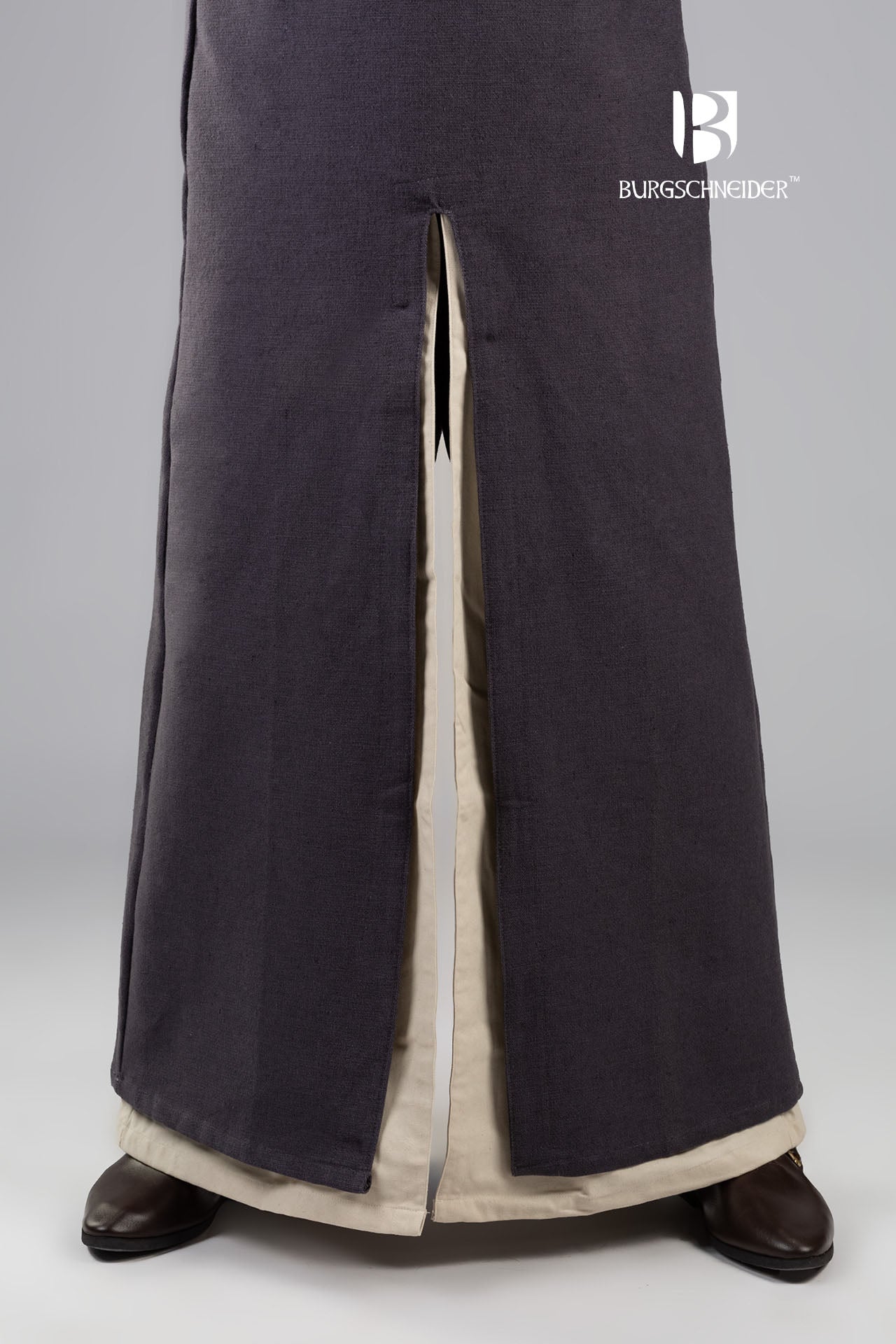 A long grey hooded tunic with long sleeves, featuring front and back slits for movement, perfect for medieval events.