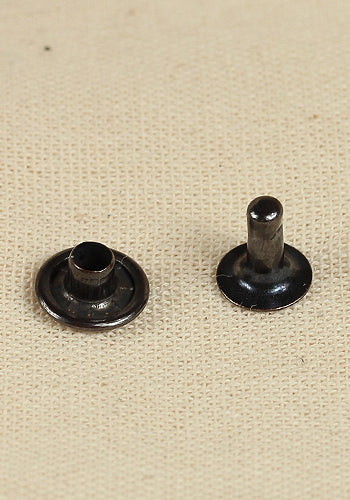 Hollow rivet Ø9,0 x 7,8 mm made of iron in anthracite color, ideal for leather crafting.
