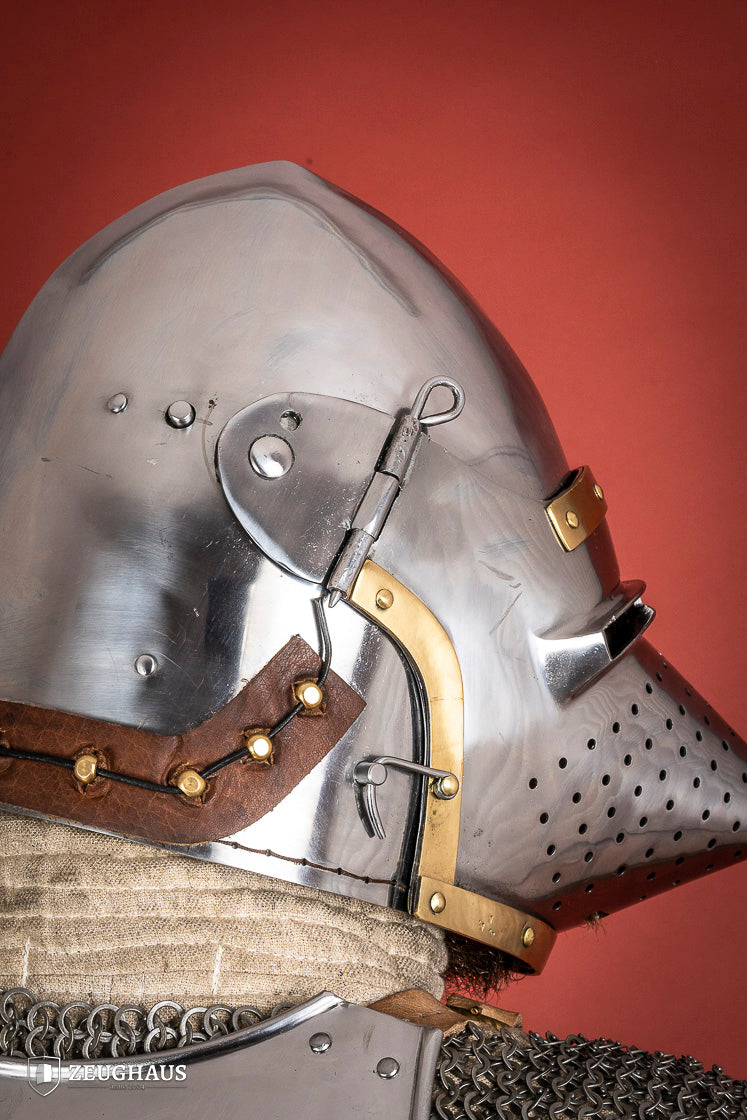 Houndskull Churburg Bascinet made of 2mm polished steel with a movable visor and leather chin strap, showcasing medieval craftsmanship.