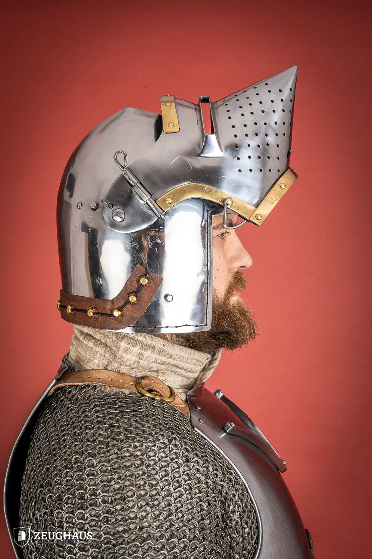 Houndskull Churburg Bascinet made of 2mm polished steel with a movable visor and leather chin strap, showcasing medieval craftsmanship.