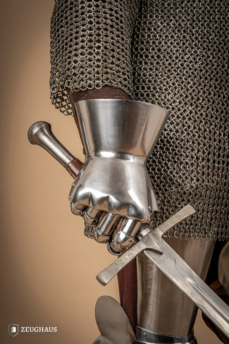 A pair of Hourglass Gauntlets made from 1.6mm steel, featuring a dramatic cuff design and leather gloves for comfort.