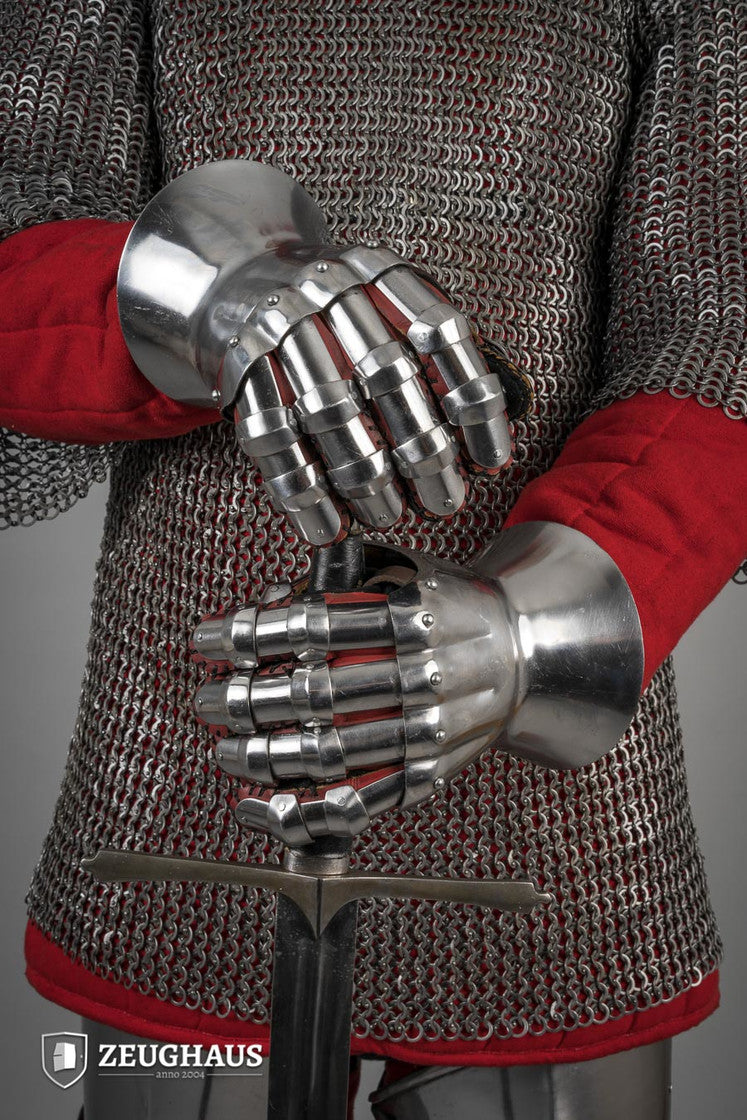 Hourglass Gauntlets made of polished steel, showcasing a wide cuff and historical design, suitable for medieval reenactments.